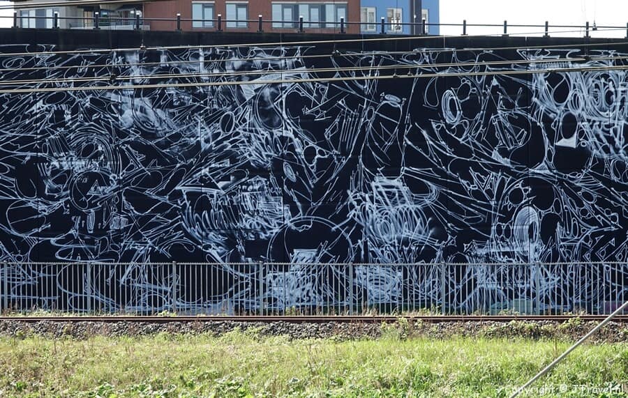 Street art van Anders Revelentlov tijdens mijn street art wandeling in de Rotterdamse wijk Feijenoord