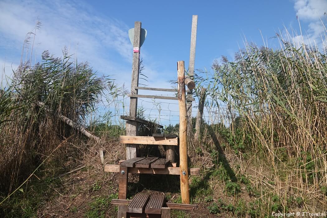 Overstap tijdens de 11e etappe van het Pad van de Vrijheid tussen Veenendaal De Klomp en Veenendaal Prattenburg