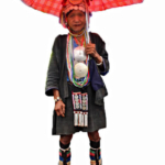 Een vrouw van het Akha bergvolk op de Doi Tung berg bij Chiang Rai<br/>Copyright © JTravel.nl Een vrouw van het Akha bergvolk op de Doi Tung berg bij Chiang Rai / Copyright © JTravel.nl