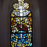 Een glas-in-loodraam in de Moederkerk in Stellenbosch / Copyright © JTravel.nl