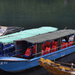 Een van de boten waarin werd gevaren naar de Phong Nha grotten<br/>Copyright © JTravel.nl Een van de boten waarin werd gevaren naar de Phong Nha grotten / Copyright © JTravel.nl