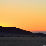 De zonsondergang tijdens de sundowner op de Little Sossus Campsite<br/>Copyright © JTravel.nl De zonsondergang tijdens de sundowner op de Little Sossus Campsite / Copyright © JTravel.nl
