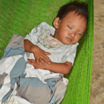 Een slapend kindje bij de botenmakerij tussen Qui Nhon en Nha Trang op 17-9-2013<br/>Copyright © JTravel.nl Een slapend kindje bij de botenmakerij tussen Qui Nhon en Nha Trang op 17-9-2013 / Copyright © JTravel.nl