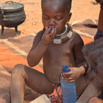 Een kind van de Himba stam in Otjikandero / Copyright © JTravel.nl