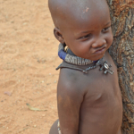 Een jongetje van de Himba stam in Otjikandero<br/>Copyright © JTravel.nl Een jongetje van de Himba stam in Otjikandero / Copyright © JTravel.nl