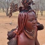 Een vrouw van de Himba stam in Otjikandero<br/>Copyright © JTravel.nl Een vrouw van de Himba stam in Otjikandero / Copyright © JTravel.nl