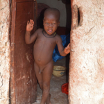 Een jongetje van de Himba stam in Otjikandero<br/>Copyright © JTravel.nl Een jongetje van de Himba stam in Otjikandero / Copyright © JTravel.nl