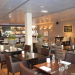 Het restaurant en de bar van het Fletcher Hotel De Cooghen in De Koog<br/>Copyright © JTravel.nl Het restaurant en de bar van het Fletcher Hotel De Cooghen in De Koog / Copyright © JTravel.nl