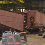 In de fabriekshal van Damen Shiprepair in Amsterdam Noord tijdens de Instameet 24H Noord<br/>Copyright ยฉ JTravel.nl In de fabriekshal van Damen Shiprepair in Amsterdam Noord tijdens de Instameet 24H Noord / Copyright ยฉ JTravel.nl