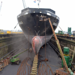 Een schip in onderhoud bij Damen Shiprepair in Amsterdam Noord tijdens de Instameet 24H Noord<br/>Copyright ยฉ JTravel.nl Een schip in onderhoud bij Damen Shiprepair in Amsterdam Noord tijdens de Instameet 24H Noord / Copyright ยฉ JTravel.nl
