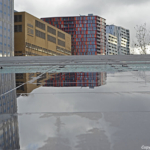 Weerspiegeling op het dank van de fietsenstalling op het Stationsplein in Rotterdam<br/>Copyright © JTravel.nl Weerspiegeling op het dank van de fietsenstalling op het Stationsplein in Rotterdam / Copyright © JTravel.nl