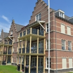Huizen langs het water in Gorinchem tijdens deel 3 van de Instameet Waterliniepad<br/>Copyright ยฉ JTravel.nl Huizen aan het water in Gorinchem tijdens deel 3 van de Instameet Waterliniepad / Copyright ยฉ JTravel.nl