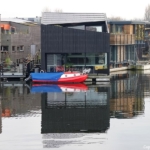 Watervilla's in Amsterdam-Noord tijdens mijn wandeling in de haven van Amsterdam <br/>Copyright © JTravel.nl Watervilla's in Amsterdam-Noord tijdens mijn wandeling in de haven van Amsterdam <br/>Copyright © JTravel.nl